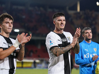 Players of Parma applaud the fans following the final whistle of the Serie A match between Lecce and Parma in Lecce, Italy, on September 21,...