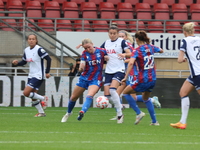 Aimee Everett of Crystal Palace Women and Anna Csiki of Tottenham Hotspur Women are in action during the Barclays FA Women's Super League so...