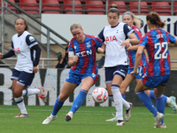 Aimee Everett of Crystal Palace Women and Anna Csiki of Tottenham Hotspur Women are in action during the Barclays FA Women's Super League so...