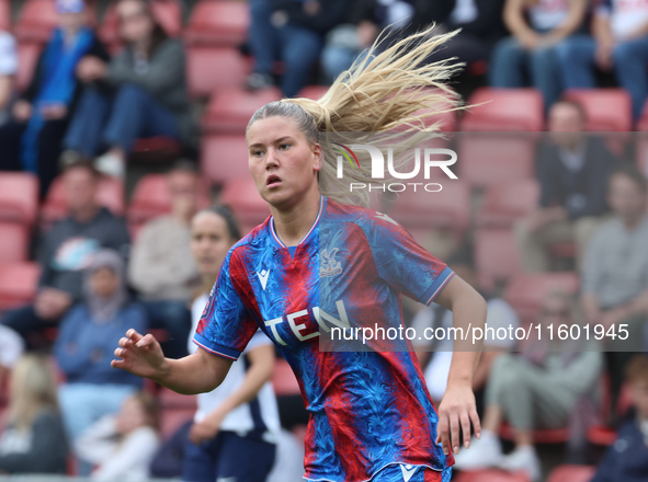 Poppy Pritchard, on loan from Manchester United, is in action during the Barclays FA Women's Super League soccer match between Tottenham Hot...