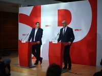 Lars Klingbeil, co-leader of the German Social Democrats, and Dietmar Woidke attend a press conference at SPD federal headquarters after the...