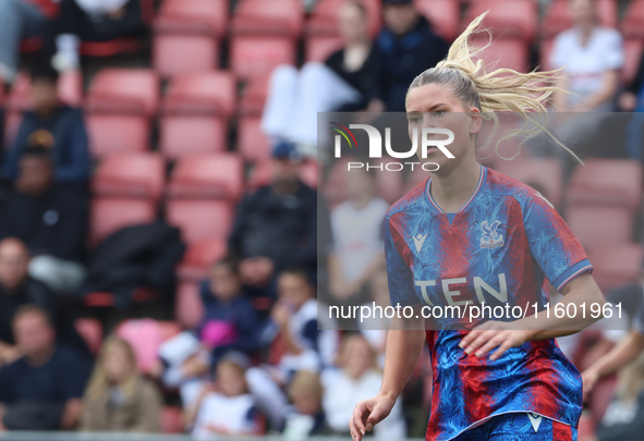 Poppy Pritchard, on loan from Manchester United, is in action during the Barclays FA Women's Super League soccer match between Tottenham Hot...