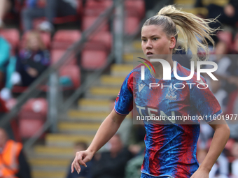 Poppy Pritchard, on loan from Manchester United, is in action during the Barclays FA Women's Super League soccer match between Tottenham Hot...