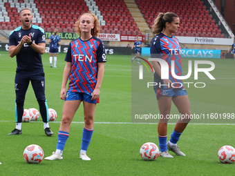 Annabel Blanchard of Crystal Palace Ladies and Katie Stengel of Crystal Palace Women participate in the pre-match warm-up during the Barclay...