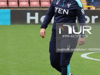 Laura Kaminski, manager of Crystal Palace Women, participates in the pre-match warm-up during the Barclays FA Women's Super League soccer ma...