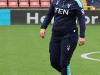 Laura Kaminski, manager of Crystal Palace Women, participates in the pre-match warm-up during the Barclays FA Women's Super League soccer ma...