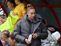 Ella Morris of Tottenham Hotspur Women participates in the pre-match warm-up during the Barclays FA Women's Super League soccer match betwee...