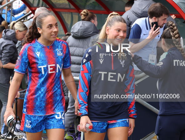 Brooke Aspin (on loan from Chelsea) of Crystal Palace Women and Poppy Pritchard (on loan from Manchester United) warm up before the Barclays...