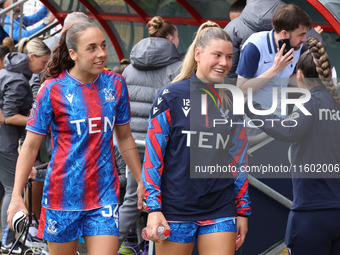 Brooke Aspin (on loan from Chelsea) of Crystal Palace Women and Poppy Pritchard (on loan from Manchester United) warm up before the Barclays...