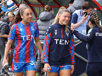 Brooke Aspin (on loan from Chelsea) of Crystal Palace Women and Poppy Pritchard (on loan from Manchester United) warm up before the Barclays...