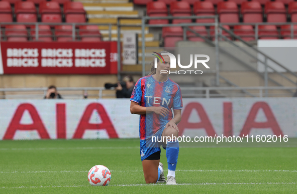 Katie Stengel of Crystal Palace Women takes the knee during the Barclays FA Women's Super League soccer match between Tottenham Hotspur Wome...