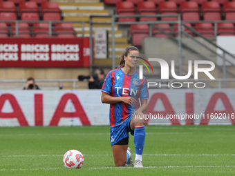 Katie Stengel of Crystal Palace Women takes the knee during the Barclays FA Women's Super League soccer match between Tottenham Hotspur Wome...