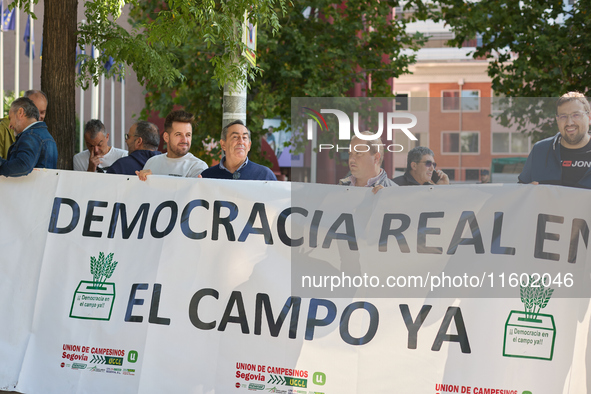 The Union de Uniones de Agricultores y Ganaderos holds a rally on Monday, September 23, in front of the European Commission building in Madr...