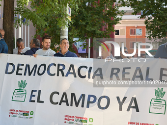 The Union de Uniones de Agricultores y Ganaderos holds a rally on Monday, September 23, in front of the European Commission building in Madr...