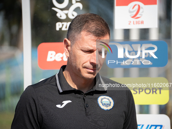 Hutnik coach Maciej Musial stands before the game between Hutnik Krakow and Resovia Rzeszow in Krakow, Poland, on September 22, 2024. Betcli...