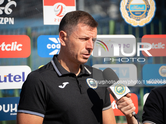 Hutnik coach Maciej Musial stands before the game between Hutnik Krakow and Resovia Rzeszow in Krakow, Poland, on September 22, 2024. Betcli...