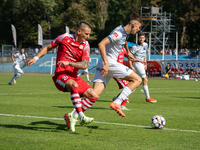 Bartlomiej Eizenchart and Michal Glogowski play during the game between Hutnik Krakow and Resovia Rzeszow in Krakow, Poland, on September 22...