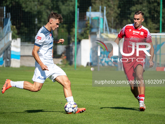 Kamil Glogowski and Marcin Urynowicz play during the game between Hutnik Krakow and Resovia Rzeszow in Krakow, Poland, on September 22, 2024...