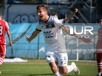 Lukasz Kedziora celebrates scoring a goal in a game between Hutnik Krakow and Resovia Rzeszow in Krakow, Poland, on September 22, 2024. Betc...