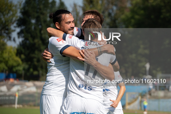 Hutnik players celebrate scoring a goal in a game between Hutnik Krakow and Resovia Rzeszow in Krakow, Poland, on September 22, 2024. Betcli...