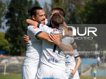 Hutnik players celebrate scoring a goal in a game between Hutnik Krakow and Resovia Rzeszow in Krakow, Poland, on September 22, 2024. Betcli...