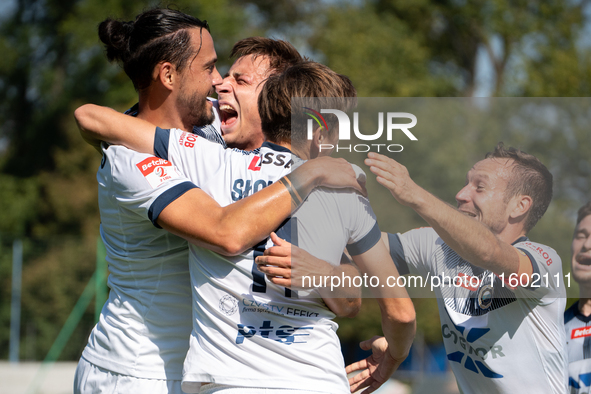 Hutnik players celebrate scoring a goal in a game between Hutnik Krakow and Resovia Rzeszow in Krakow, Poland, on September 22, 2024. Betcli...