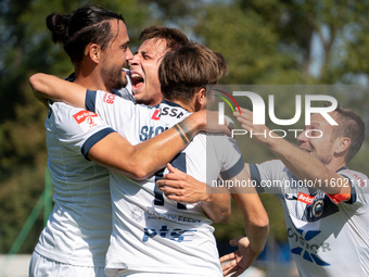 Hutnik players celebrate scoring a goal in a game between Hutnik Krakow and Resovia Rzeszow in Krakow, Poland, on September 22, 2024. Betcli...