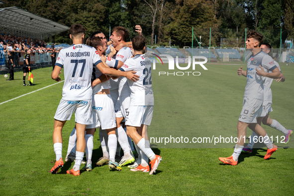 Hutnik players celebrate scoring a goal in a game between Hutnik Krakow and Resovia Rzeszow in Krakow, Poland, on September 22, 2024. Betcli...