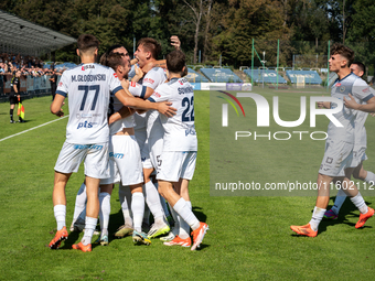 Hutnik players celebrate scoring a goal in a game between Hutnik Krakow and Resovia Rzeszow in Krakow, Poland, on September 22, 2024. Betcli...