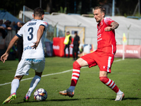 Radoslaw Adamski and Filip Jania participate in the game between Hutnik Krakow and Resovia Rzeszow in Krakow, Poland, on September 22, 2024....