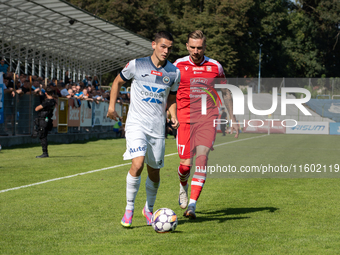 Radoslaw Adamski and Filip Jania participate in the game between Hutnik Krakow and Resovia Rzeszow in Krakow, Poland, on September 22, 2024....