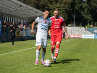 Radoslaw Adamski and Filip Jania participate in the game between Hutnik Krakow and Resovia Rzeszow in Krakow, Poland, on September 22, 2024....