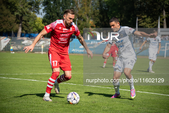 Radoslaw Adamski and Filip Jania participate in the game between Hutnik Krakow and Resovia Rzeszow in Krakow, Poland, on September 22, 2024....