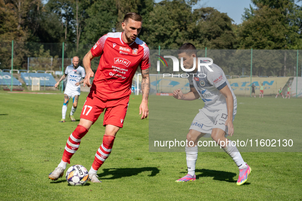 Radoslaw Adamski and Filip Jania participate in the game between Hutnik Krakow and Resovia Rzeszow in Krakow, Poland, on September 22, 2024....