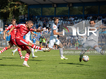 Maciej Gorski and Igors Tarasovs play during the game between Hutnik Krakow and Resovia Rzeszow in Krakow, Poland, on September 22, 2024. Be...