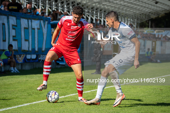 Maksymilian Hebel and Patrik Misak play during the game between Hutnik Krakow and Resovia Rzeszow in Krakow, Poland, on September 22, 2024....