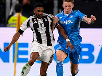 Gleison Bremer of Juventus battles for the ball with Francis McTominay of SSC Napoli during the Serie A match between Juventus and Napoli at...