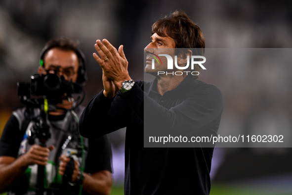 Former Juventus player and coach Antonio Conte, head coach of SSC Napoli, salutes the Juventus fans following the final whistle of the Serie...