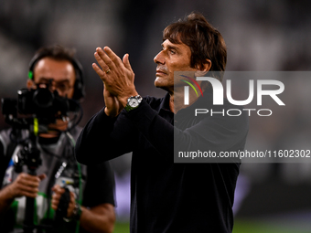 Former Juventus player and coach Antonio Conte, head coach of SSC Napoli, salutes the Juventus fans following the final whistle of the Serie...