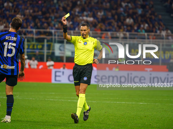 Maurizio Mariani referees during the match between FC Internazionale and AC Milan in Serie A at Giuseppe Meazza Stadium in Milan, Italy, on...