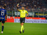 Maurizio Mariani referees during the match between FC Internazionale and AC Milan in Serie A at Giuseppe Meazza Stadium in Milan, Italy, on...