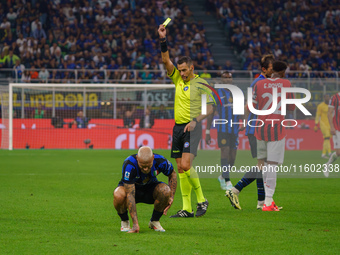 Maurizio Mariani referees during the match between FC Internazionale and AC Milan in Serie A at Giuseppe Meazza Stadium in Milan, Italy, on...