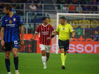 Maurizio Mariani referees during the match between FC Internazionale and AC Milan in Serie A at Giuseppe Meazza Stadium in Milan, Italy, on...