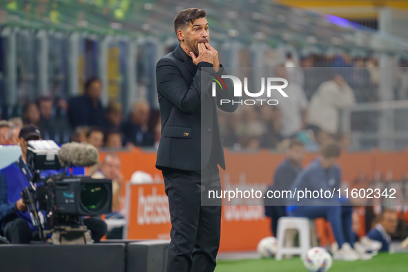 Paulo Fonseca is the head coach of AC Milan during the match between FC Internazionale and AC Milan in Serie A at Giuseppe Meazza Stadium in...