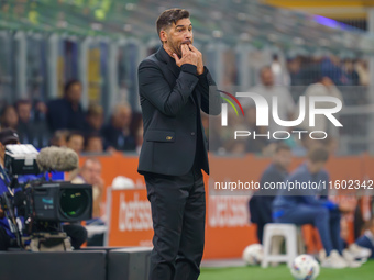 Paulo Fonseca is the head coach of AC Milan during the match between FC Internazionale and AC Milan in Serie A at Giuseppe Meazza Stadium in...