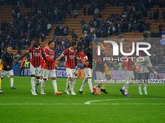 The team of AC Milan celebrates during the match between FC Internazionale and AC Milan, Serie A, at Giuseppe Meazza Stadium in Milan, Italy...