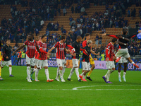 The team of AC Milan celebrates during the match between FC Internazionale and AC Milan, Serie A, at Giuseppe Meazza Stadium in Milan, Italy...