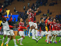 The team of AC Milan celebrates during the match between FC Internazionale and AC Milan, Serie A, at Giuseppe Meazza Stadium in Milan, Italy...