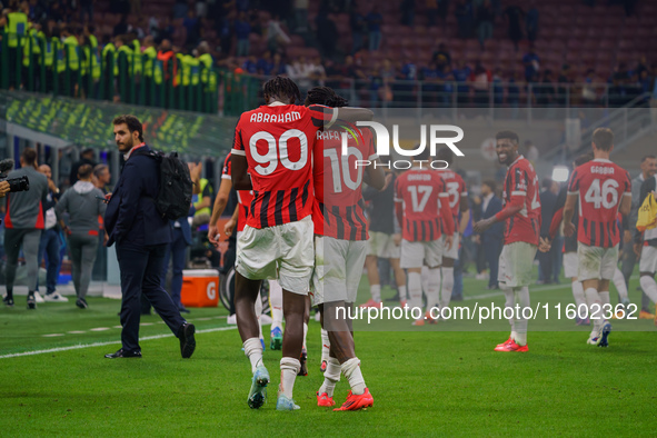 Rafael Leao and Tammy Abraham celebrate during the match between FC Internazionale and AC Milan in Serie A at Giuseppe Meazza Stadium in Mil...