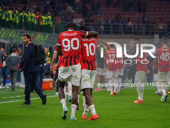 Rafael Leao and Tammy Abraham celebrate during the match between FC Internazionale and AC Milan in Serie A at Giuseppe Meazza Stadium in Mil...